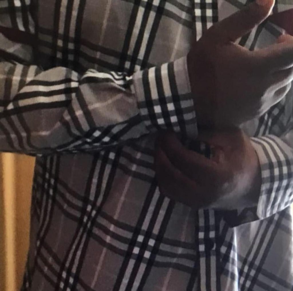 Checkered shirt with hands