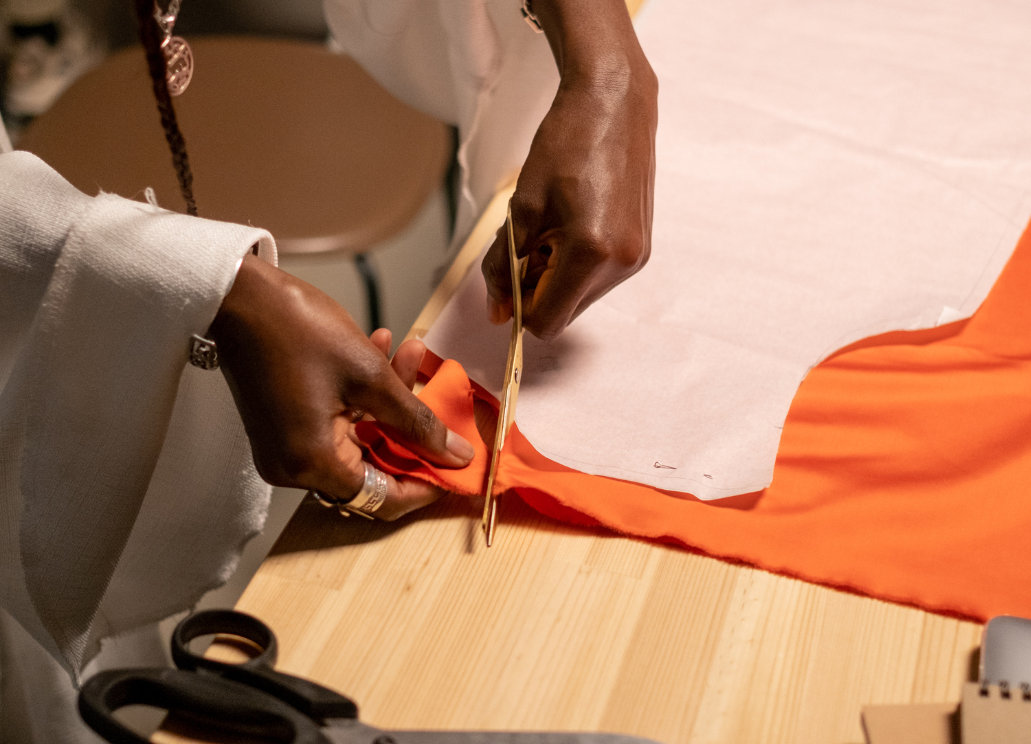 Cutting fabric with scissors