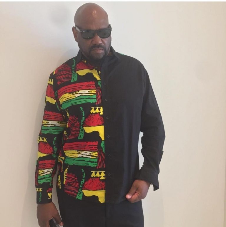 Man wearing colorful patterned shirt